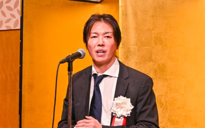 日工組通常総会で挨拶する榎本善紀理事長